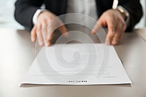 Close up image of resume at desk of employer