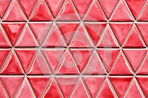 Glossy Red Triangular Tiles Pattern Background.