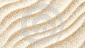 A close-up image of a sandy surface with a textured, wavy pattern.