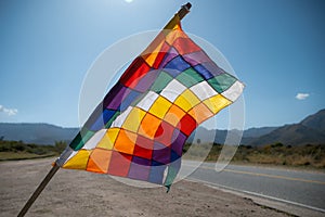 Close up image of a silk Wiphala Flag - a symbol commonly used to represent native peoples of the Andes photo