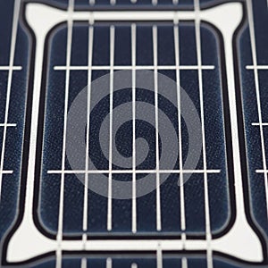 Is rectangular with visible busbars and fingers that help collect and