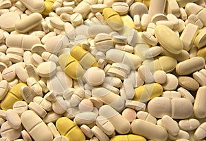 Close-up image of a variety of pharmaceutical pills scattered