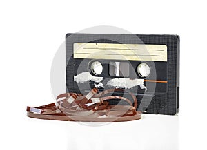 Close up image of a vintage audio cassette tape isolated on white background