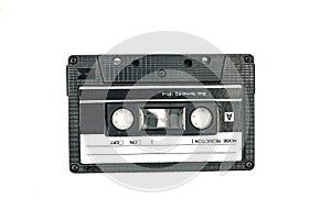 Close up image of a vintage audio cassette tape isolated on white background. Top view