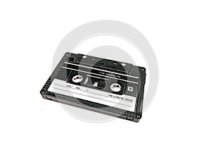 Close up image of a vintage audio cassette tape isolated on white background. Top view