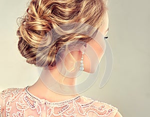 Close-up image of wedding and evening hairstyle.