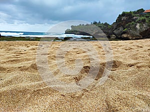 Close up image of white sand on Wonosari beach