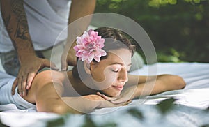 Close up image of women enjoy in massage at nature.
