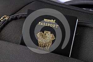 Close up of India Passport in Black Suitcase Pocket