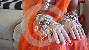 Close-up of Indian ceremonial clothes and costume jewelry before a wedding.