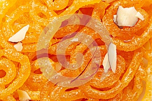 Close-Up of Indian Classical  Sweet Jalebi . Garnished with kesar Saffron and dry nuts, Jalebi is one of the most delicious