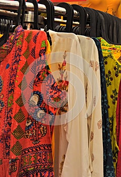 Indian woman fashion salwar kameez kurta in shop display photo