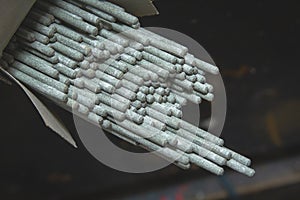 Close-up industrial arc stick welding electrodes