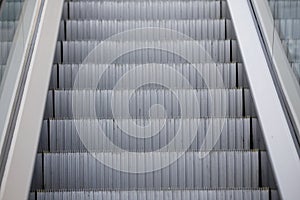 Close-up. Infrastructure at the airport. Metal escalator steps