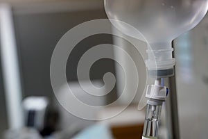 Close up Infusion bottle pump with saline solution drip and clipping path for patient admit room in hospital.