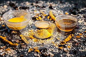 Close up of Ingredients of ayurvedic treatment or an ayurvedic face pack i.e Honey,chickpea flour and paste,turmeric powder and ro