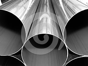 Close up from inox steel large pipes on black and white photo