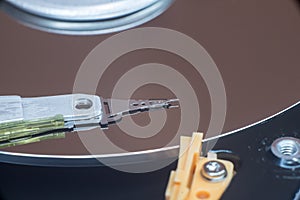 Close up inside of computer disk drive HDD