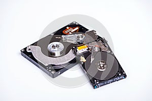 Close up inside of computer hard disk drive HDD isolated on white background