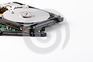 Close up inside of computer hard disk drive HDD on white background
