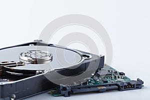 Close up inside of computer hard disk drive HDD on white background