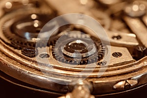 Close up of the inside of a gold pocket watch