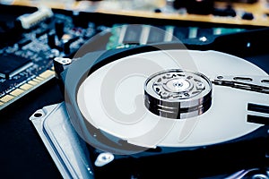 Close up inside of hard disk drive. Blue tone image