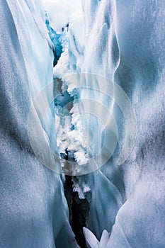 Close up in the inside of an ice cave in Matanuska Glacier, Alaska. Snowflakes on the ceiling.