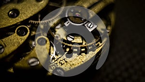 Close up inside mechanical vintage watch. Handmade engraving. Concept eternity, teamwork. Soft focus. Free space for text. Macro.