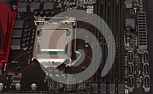 Close up of installed CPU processor on modern, new, gaming motherboard