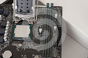 Close up of installed CPU processor on modern, new motherboard