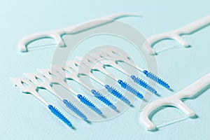 Close-up interdental brushes on the blue background