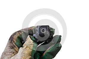 Close-up Interior view with rear view camera in the arm with glove of mechanic. Auto service industry. Safety drive