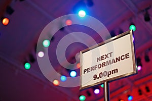 Close-up interval display stand at a night indoor performance