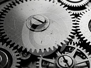 Close-up of intricate metallic clockwork gears and internal mechanism