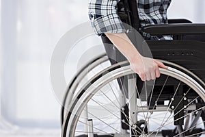 Close up invalid person wheelchair. High quality and resolution beautiful photo concept