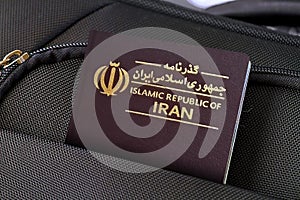 Close up of Iran Passport in Black Suitcase Pocket