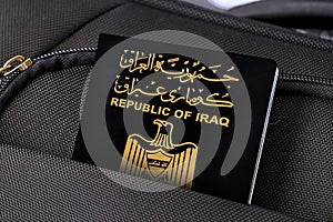 Close up of Iraq Passport in Black Suitcase Pocket