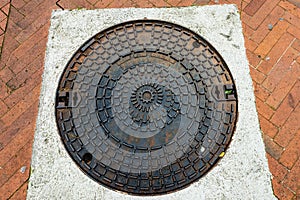 Iron rusty manhole cover for sewage - Italy