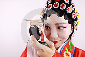 Close-up isolated white background Beijing opera Chinese female actress woman makeup traditional headwear costume drama portrait