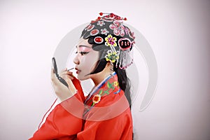 Close-up isolated white background Beijing opera Chinese female actress woman makeup traditional headwear costume drama portrait