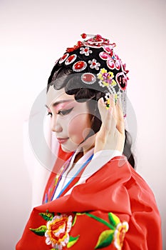 Close-up isolated white background Beijing opera Chinese female actress woman makeup traditional headwear costume drama portrait