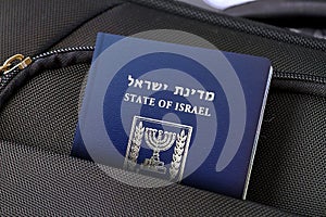 Close up of Israel Passport in Black Suitcase Pocket