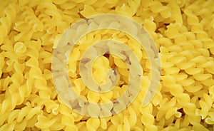 Close up Italian Fusilli Macaroni Pasta background or texture