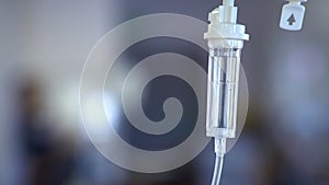 Close up of IV drip in hospital operating theatre