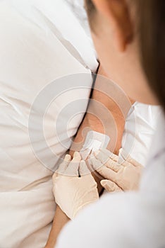 Close-up of a iv drip in patient's hand