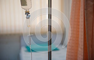 Close up IV saline solution drip for patient hospital