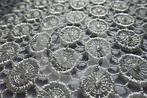Close-up of ivory white lacy fabric