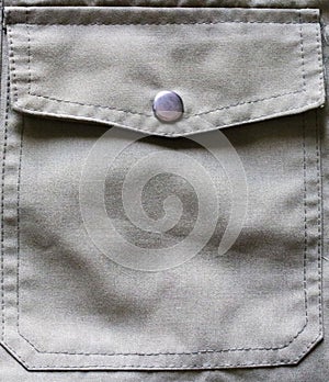 Close Up Of Jacket Buttons And Pockets.