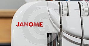 Close-up of Janome brand logo on a sewing machine. Minsk, Belarus, 2023